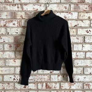 Black turtleneck sweater